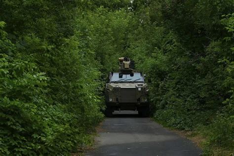 Australian Bushmaster Armored Vehicles With An Eos R400 Mk2 Combat