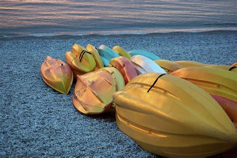 Upturned Boats On Beach Photograph By Angelica Linnhoff Fine Art America