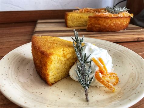 orange cornmeal cake with candied rosemary and orange bourbon soak — beneath the crust