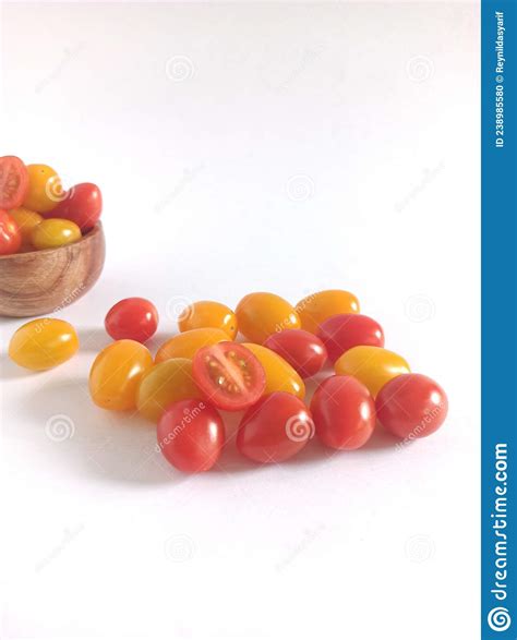 Fresh And Shiny Red And Yellow Cherry Tomatoes Isolated On White