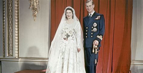 Her duchesse satin wedding dress was embroidered with jasmine and lilac blossoms embellished with crystals and more than 10,000 seed pearls. 8 Things You Don't Know About Queen Elizabeth II
