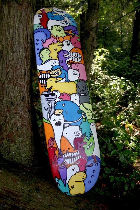 custom skateboard done in acrylic and sharpie with images skateboard art skateboard deck