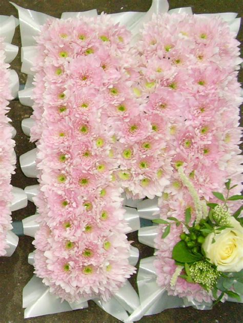 Families can take the flowers home if they like, but often flowers are left in the cemetery. Mum Tribute - Funeral Flowers Horsham