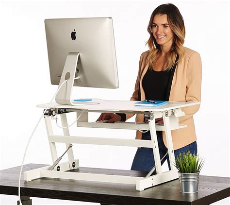 Proper desk posture prevents physical issues like back pain, repetitive strain injuries, and muscle tension. Standing Desk - the DeskRiser - Height Adjustable | Heavy ...