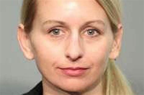 Blonde Teacher Grins In Police Mugshot After Arrest Over Oral Sex With