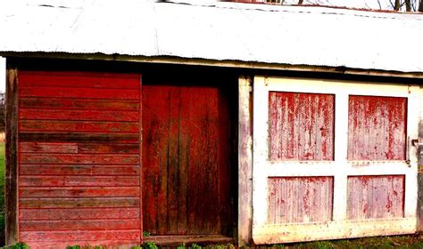 Weathered Red Barn Door Photograph By Mykul Anjelo Fine Art America