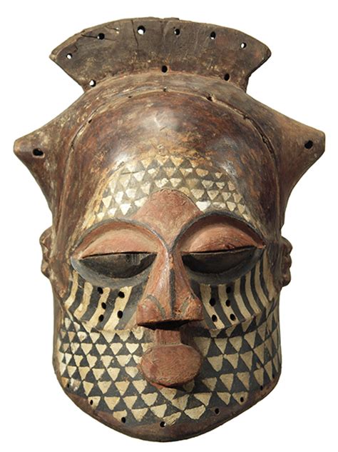 Nyibita masks are utilized in this fine 'nyibita' mask has an exceedingly thin form with a flat narrow forehead deeply carved into. Kuba Helmet Mask 4, DRC