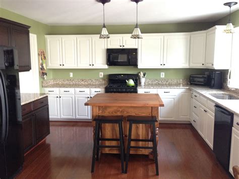 Behr swiss coffee white w/ tint of cream, 1 cup faux glaze to 1/4 cup black paint, brush on them wipe off with wet rag is creative inspiration for us. Final product ... My dream kitchen! White cabinets (Behr ...