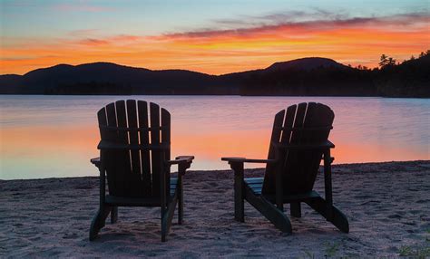 Adirondack Chair At The Ocean At Sunset