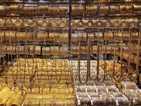 Many Gold Bracelets Are On Display In A Store