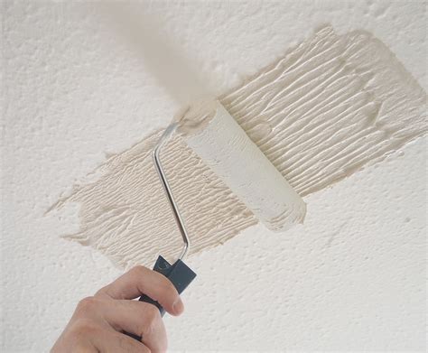 Repair a drywall ceiling and texture the ceiling with a stipple brush. How To Plaster A Ceiling Over Artex