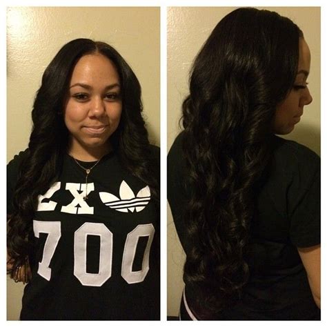 Middle Part Sew In With Minimal Hair Left Out And Soft Curls For