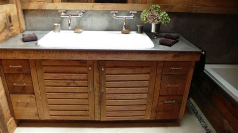 3 drawers and sliding i hired a plumber to install the pipes to the sinks and install my faucets and that was it! Double faucet trough sink - custom built reclaimed wood ...