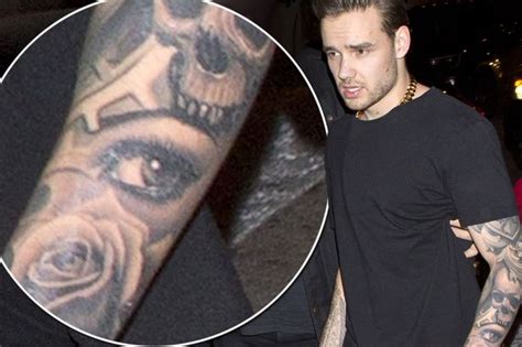 The tattoo is not, in fact, real. Has Liam Payne got Cheryl's EYE tattooed on his arm? One ...