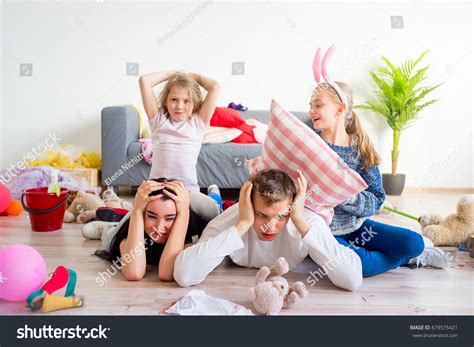 Tired Parents Romping Kids Stock Photo 679575421 Shutterstock