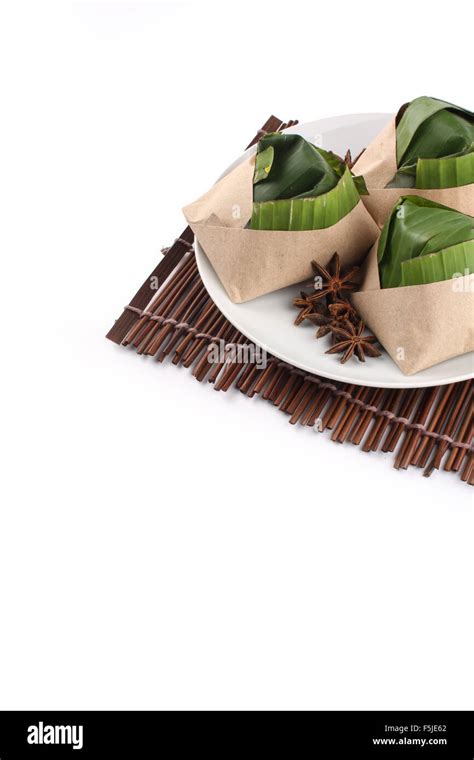Traditional Fresh Malaysian Nasi Lemak Packed With Banana Leaf In White