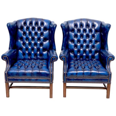 Pair Of English Hollywood Regency Blue Leather Wing Back Chesterfield