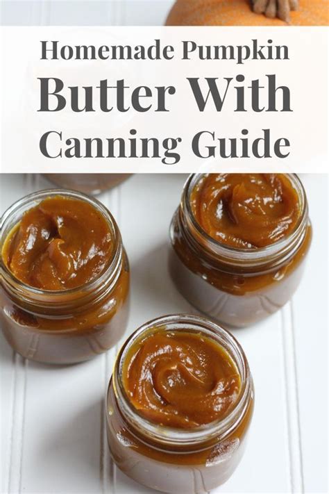 Homemade Pumpkin Butter With Canning Guide In Mason Jars On A White