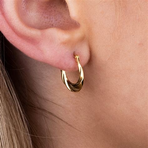Ct Yellow Gold Twist Creole Hoop Earrings Buy Online Free Insured