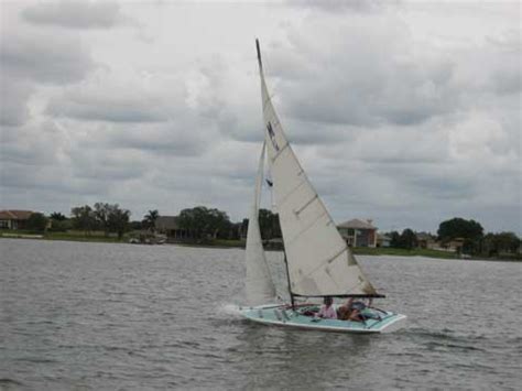 Scow — a scow, in the original sense, is a flat bottomed boat with a blunt bow, often used to haul garbage or similar bulk freight; Melges M16 Scow, 1978, sailboat for sale from Sailing Texas