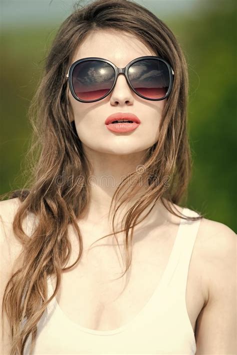 Fashion Woman Model Posing Woman In Summer Sunglasses With Long Curly