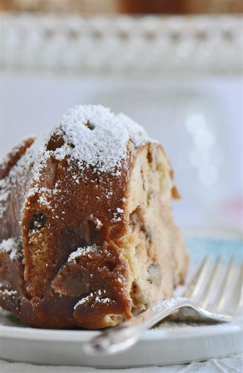 Apple Walnut Raisin Cake With Cream And Cinnamon Glaze Sifting Focus