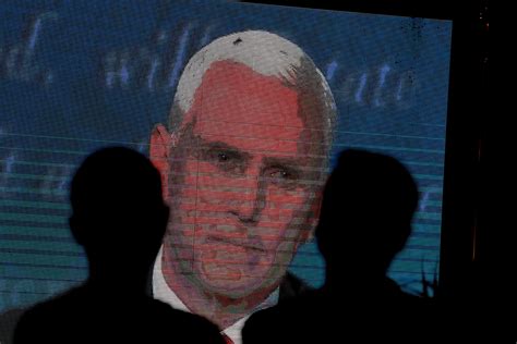 here s the buzz on the fly in mike pence s hair at the vice presidential debate hhbern