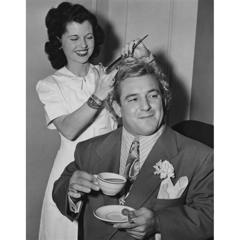 Wrestler Gorgeous George Holding A Tea Cup As His Hair Is Styled By