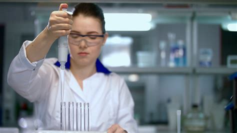 Researcher Working With Dropper In Laboratory Lab Worker Using