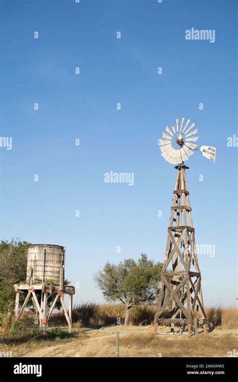 Water Tower And Windmill Stock Photo Alamy