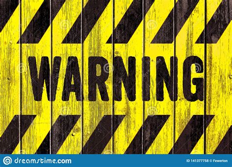 WARNING Danger Sign Word Text As Stencil With Yellow And Black Stripes Painted On Wood Wall ...
