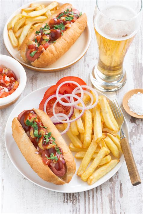 Fast Food Hot Dog With French Fries Beer And Snacks