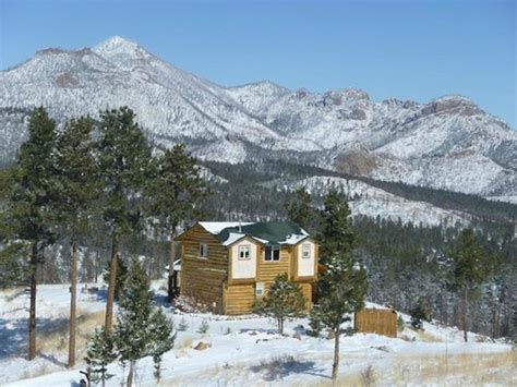 Five secluded luxury cabins with private hot tubs, fireplaces, high speed internet and much more. Wilderness Cabin Winter exterior & view - Picture of Pikes ...