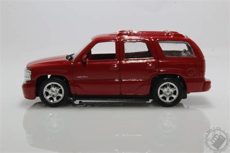 2001 gmc yukon denali suv 1 60 scale diecast model red by welly loving truth books and ts