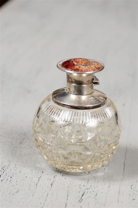 English Victorian Crystal Toiletry Bottle With Silver Lid From The 19th