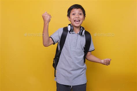 Happy Asian Student Boy Stock Photo By Garakta Studio Photodune