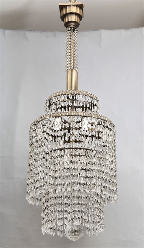 A French Art Deco Crystal Chandelier In The Manner Of Emile Jacques