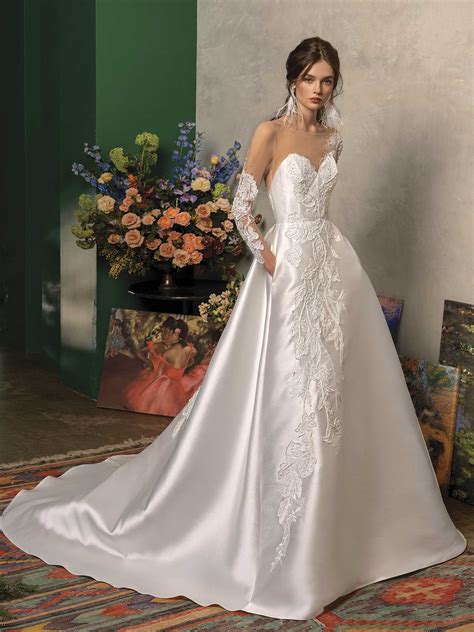 Check out our pocket wedding dress selection for the very best in unique or custom, handmade pieces from our dresses shops. Papilio Long sleeved ball gown wedding dress with pockets