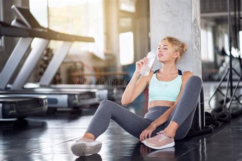Fitness Woman Drinking Water From Bottle In The Gym Stock Image Image