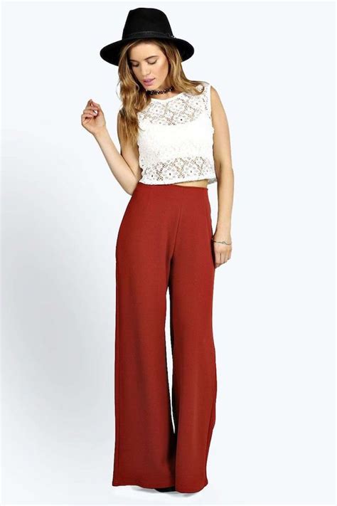 11 Pairs Of Flares You Need For Fall Red Wide Leg Pants Wide Leg Pants Outfit Flare Trousers