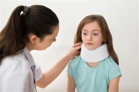 Doctor Examining Neck Of Patient Stock Image Image Of Pain Care