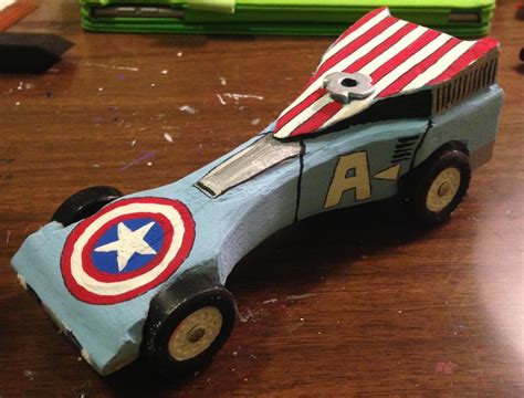 Was toying with different ideas for propulsion for my pinewood derby car. Captain America Pinewood Derby car I painted for my son ...
