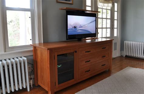 For using this tv in your kitchen you may appreciate this flip down under cabinet. Hidden TV Lifts - Ideas for Built in or Hidden TV Lift ...
