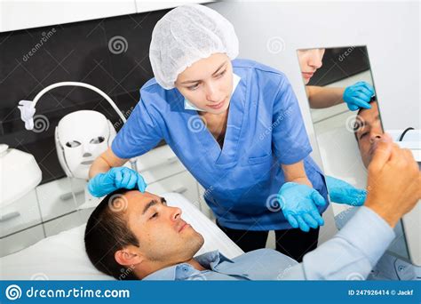 Woman Beautician Giving Consultation To Man Client Stock Photo Image