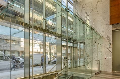 manulife office tower balustrade canopy vestibule enclosure elevator architectural glass