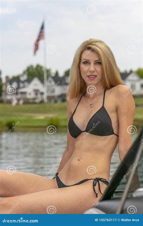 Beautiful Bikini Model Relaxing On A Boat By The Docks Stock Image Image Of Health Beautiful