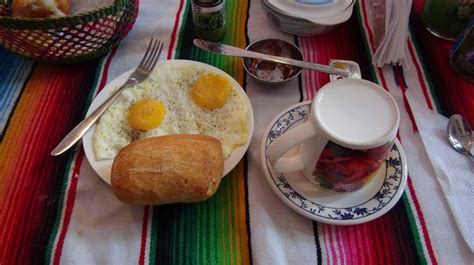 Traditional Peruvian Breakfast Of Fried Or Scambled Eggs With Fresh Pan Bread Served Fresh
