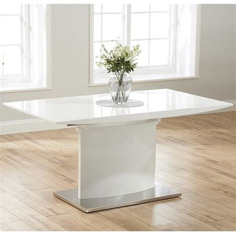 It's made from solid and engineered wood with a versatile dark oak finish. Novello Extendable Pedestal Dining Table In White High ...