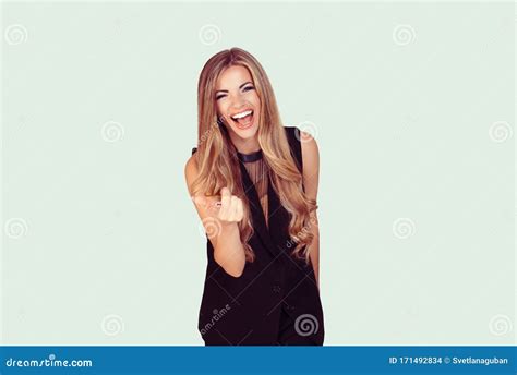 Portrait Of A Beautiful Woman Laughing Ecstatic Pointing At You