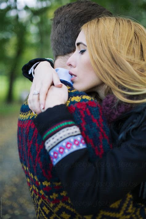 Happy Couple Hugging Outdoors By Stocksy Contributor Jovana Rikalo Stocksy